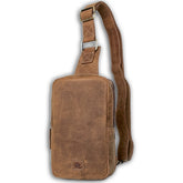 Brown full-grain leather sling bag for everyday carry with concealed carry pocket