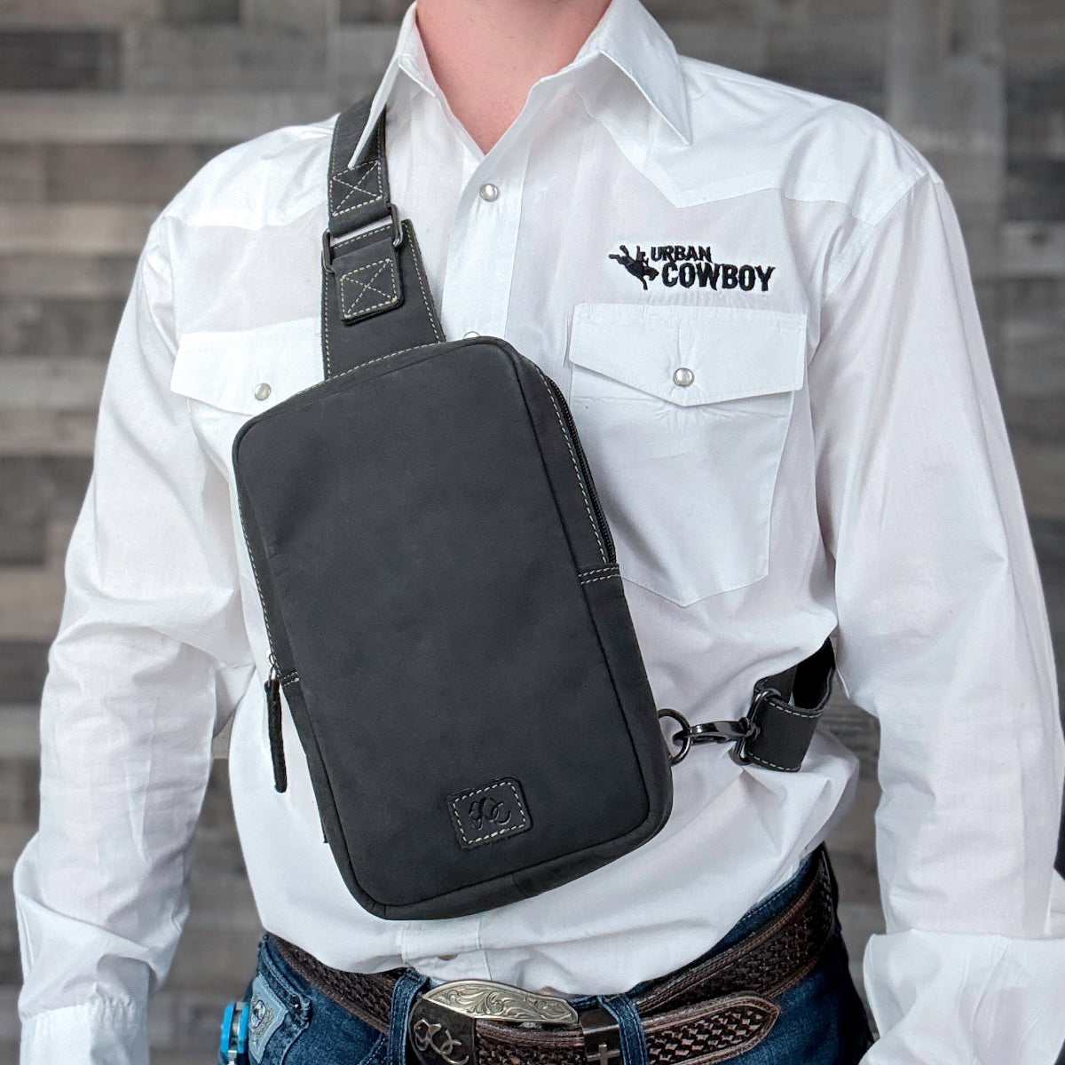 Black leather EDC sling bag with RFID blocking pocket and phone storage