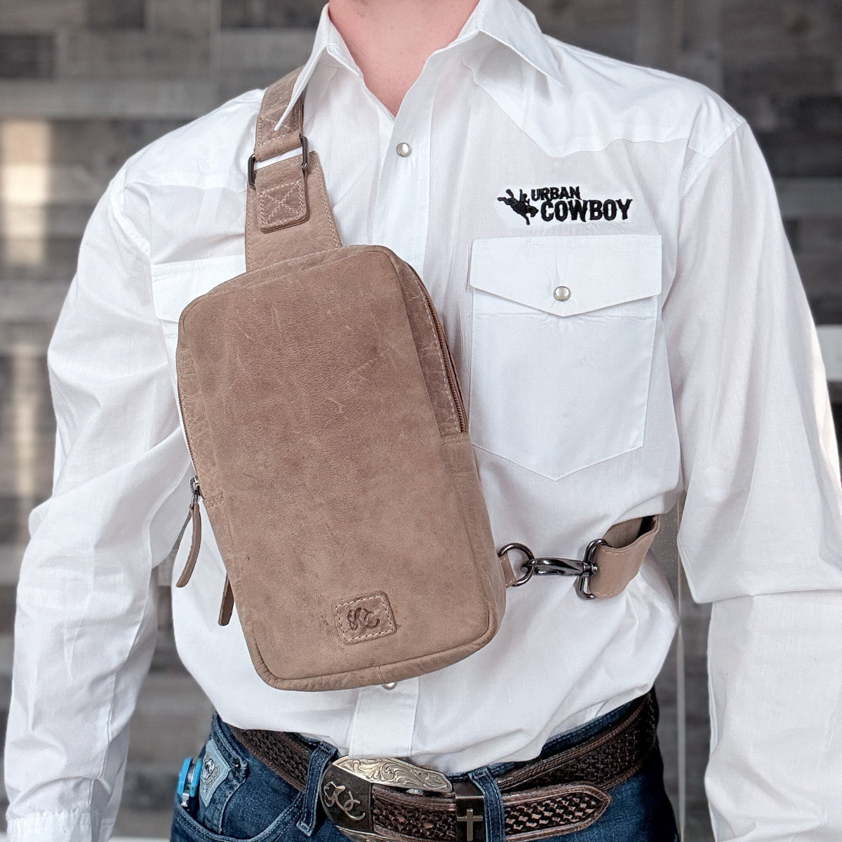 UC Leather sand CCW sling bag with hidden concealed carry pocket