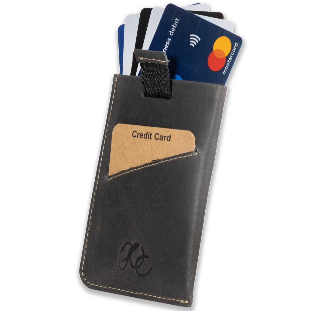 Slim leather card sleeve with RFID protection. Made from full grain leather with pull-tab access—holds 1–10 cards and built for minimalist daily carry-Black