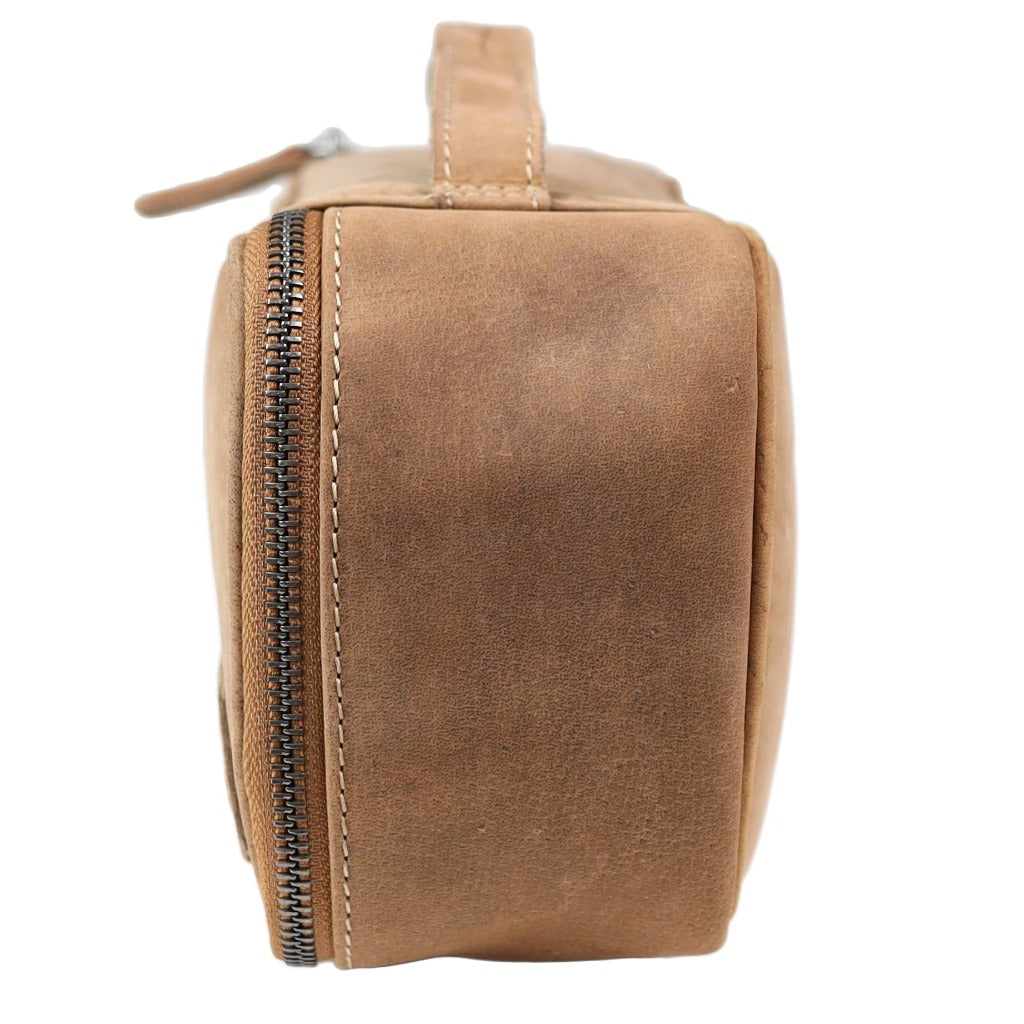 Brown leather toiletry bag with YKK zipper and padded interior